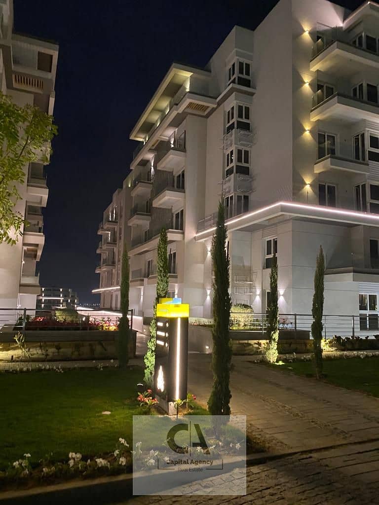 Ready to move Ground floor apartment with garden for sale in Fifth Settlement in Mountain View iCity compound. Cash price or pay 5% down and installm - Widok 2