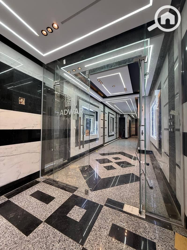 Apartment for sale in the city of Abad Al-Rahman on the Maadi ring road behind the Al-Said Club in Katameya, with an area of 84 meters, two rooms, a reception, a bathroom, and a kitchen in semi-finishing. - Mehr