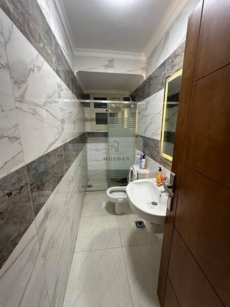Ultra Super Lux apartment for rent furnished with hotel-quality finishing at the highest level with an open view in the Tenth District in front of Carrefour Zahra Maadi - Mehr
