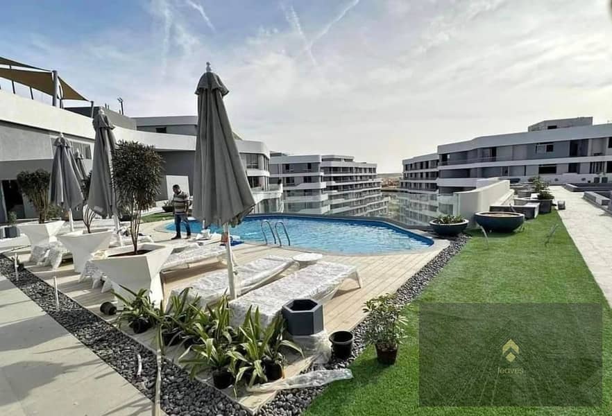 Apartment for sale with the lowest down payment and longest payment period in Bloomfields Surf Sur compound in Madinaty - Widok 2