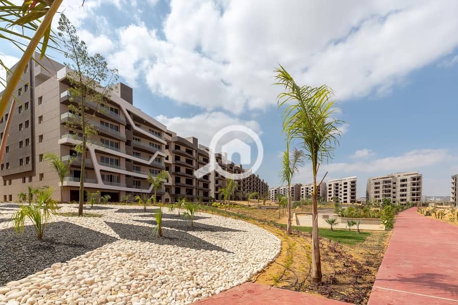 Immediate delivery with 588,000 EGP down payment – 2-bedroom apartment for sale with landscape view and iconic tower view, ready for viewing in Mostak – další