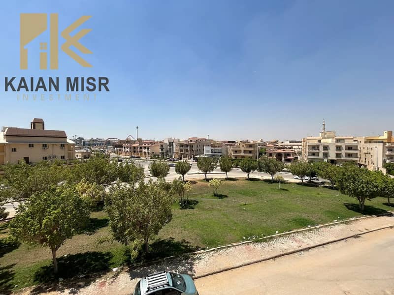 An elevated land plot of 190 m + 20 m garden with a front view of a garden in Al-Shorouk City next to Saudi and the French University - Vista 5
