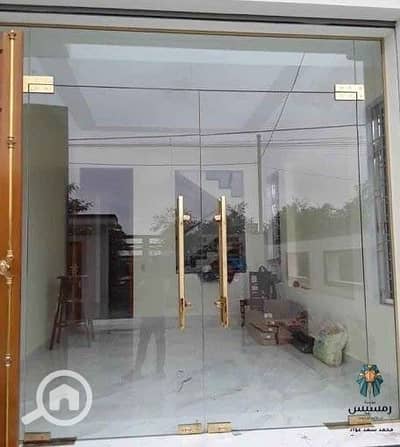 محلات تجارية  للبيع في الشيخ زايد، الجيزة - Securit glass door. jpeg