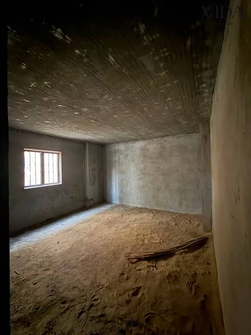 Apartment for Sale in District 11, 6 October City at a Special Price, Prime Location Close to Services and Main Roads, Ideal for Living or Investment. - Widok 2