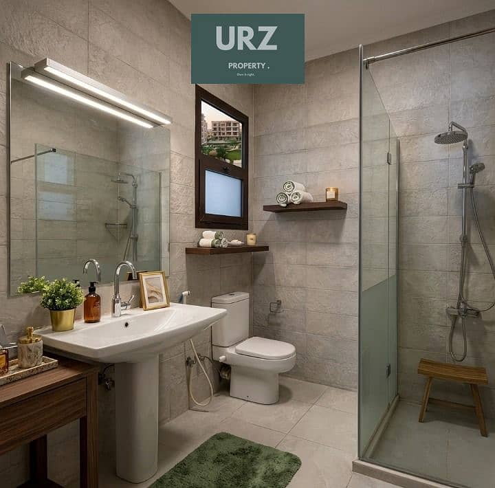 Apartment for sale in Sarai 12 years installments and 50% discount located on Center Park on Suez Road next to Madinaty near AUC - Widok 2