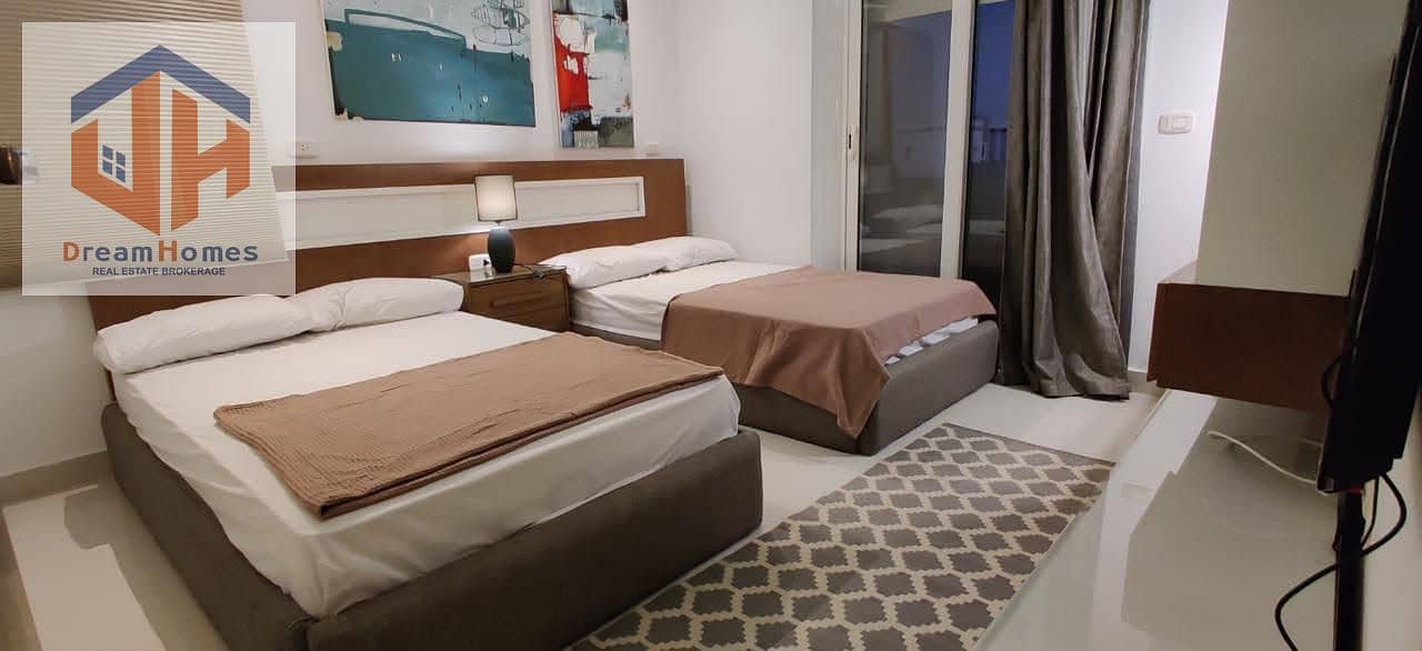 Ultra-modern furnished independent villa for sale in the North Coast at Amwaj compound with a sea view. - Mehr