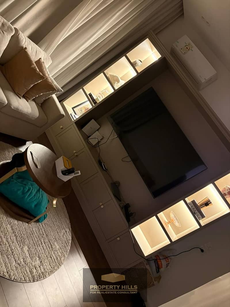For sale, a 230 sqm apartment in a compound on Al Bustan main street, ultra super lux finished. - More