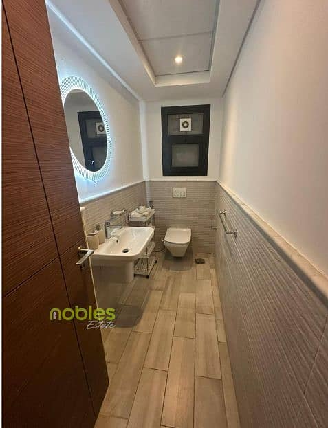 Apt with private garden ,Furnished, ready to move and in a prime location In Aura Compound Cairo Festival, 5th Settlement, New Cairo - Ansicht 6