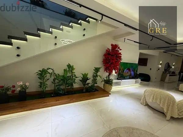 A golden opportunity to sell a 380m duplex with furniture and appliances, a private garden, an independent entrance, a sea view, and a prime location in the 9th District, Sheikh Zayed, with spacious areas. - Ansicht 5