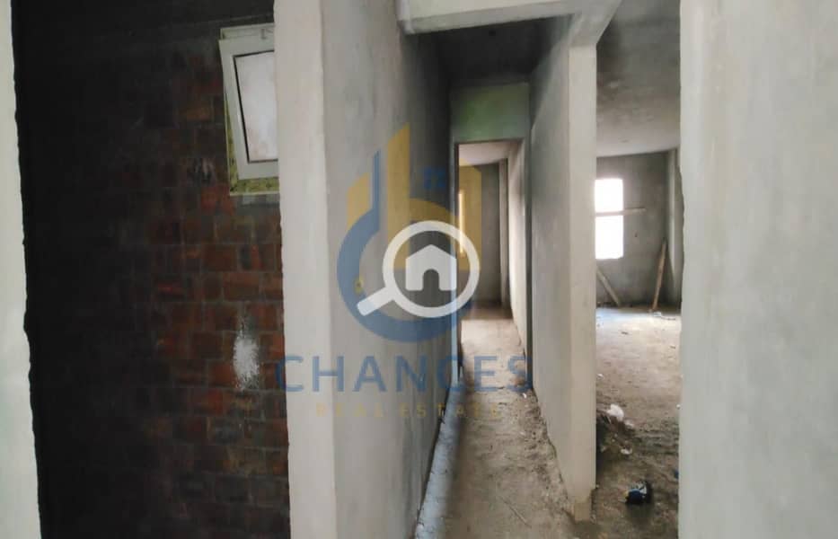 Ground floor apartment with garden for sale in Emerald Compound, Shatr 10, Zahraa El Maadi, with a landscape view. - Mehr