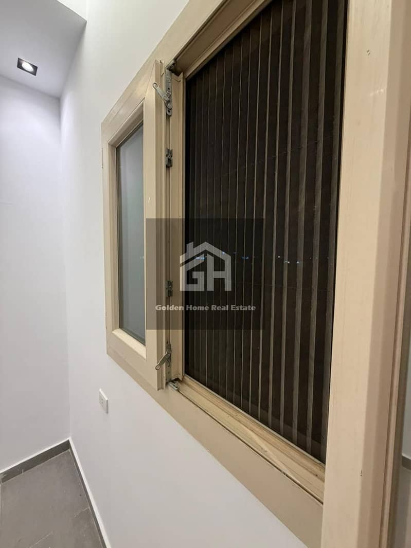 Air-conditioned studio for rent with dressing, land view at Elkhmayel Compound - Sheikh Zayed - Widok 5
