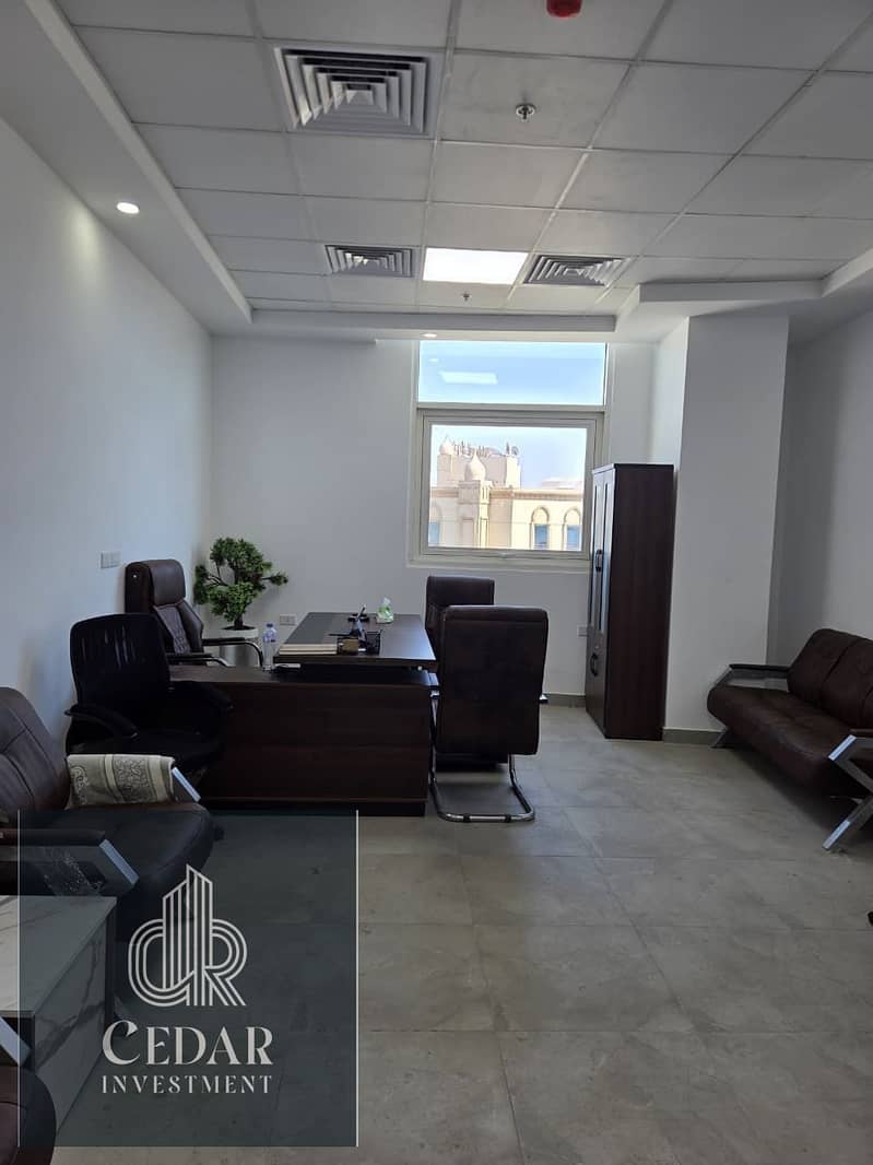 Office for rent on Al-Mustaqbal Street directly in the heart of Sheikh Zayed in Cargo Mall behind Saudi next to Global Hospital. - Ansicht 6