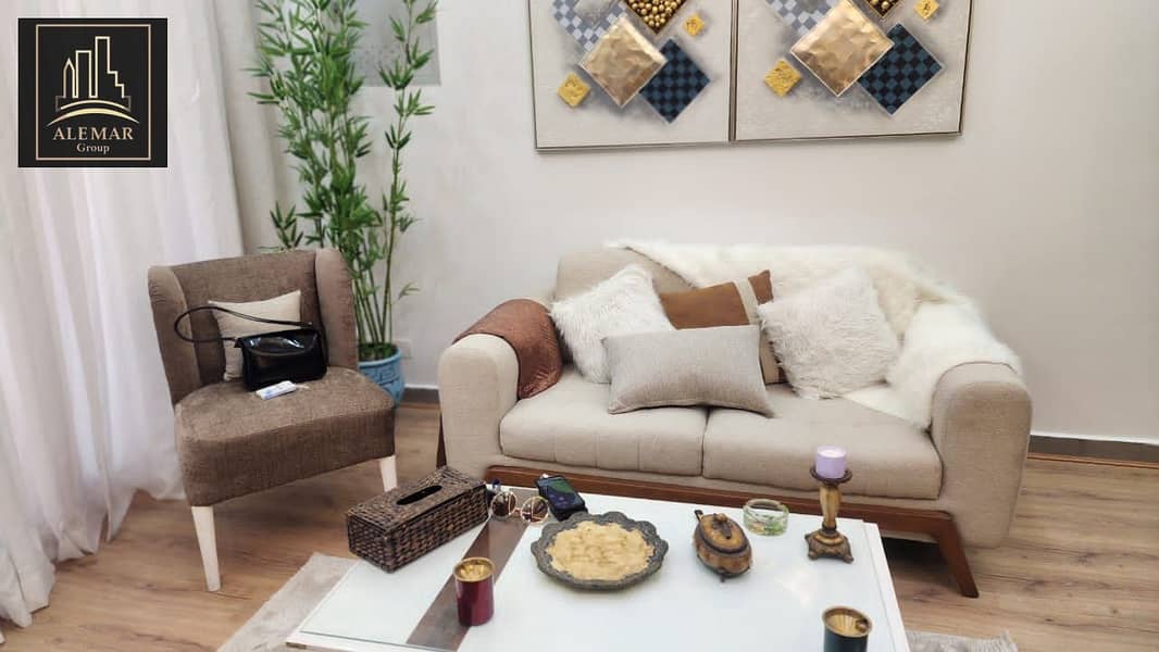 For sale in Privado Madinaty, an 84m² apartment with fully custom finishes, street view, second floor, no additional charge, with a down payment of 4, - Vista 2