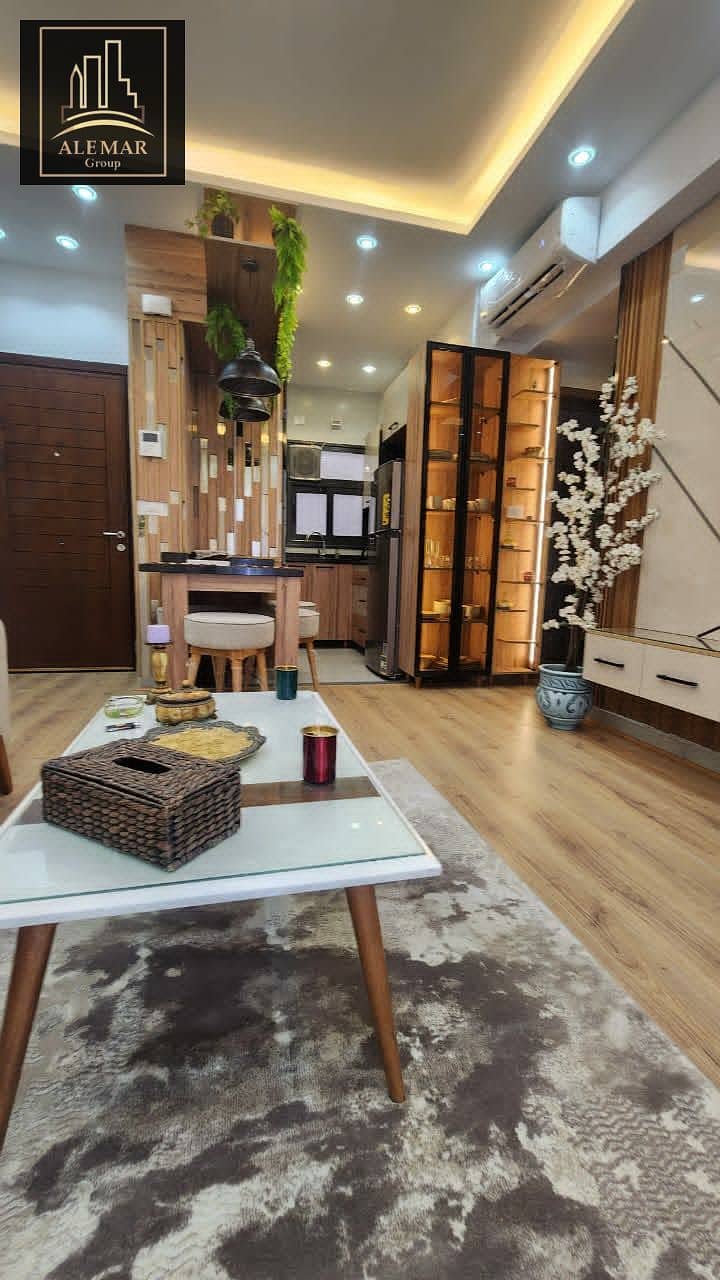 For sale in Privado Madinaty, an 84m² apartment with fully custom finishes, street view, second floor, no additional charge, with a down payment of 4, - Vista 6