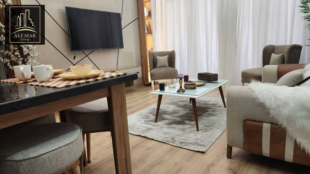 For sale in Privado Madinaty, an 84m² apartment with fully custom finishes, street view, second floor, no additional charge, with a down payment of 4, - Altro