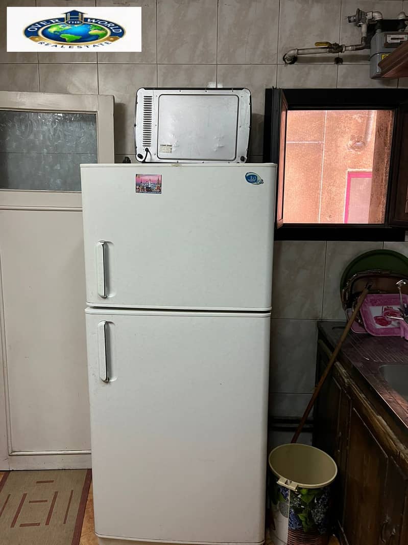 Furnished apartment for rent in Zahra Al-Maadi next to Khair Zaman, consisting of three bedrooms, a reception, 2 bathrooms, and a kitchen, with air conditioning, Wi-Fi, and natural gas. - Aanzicht 5