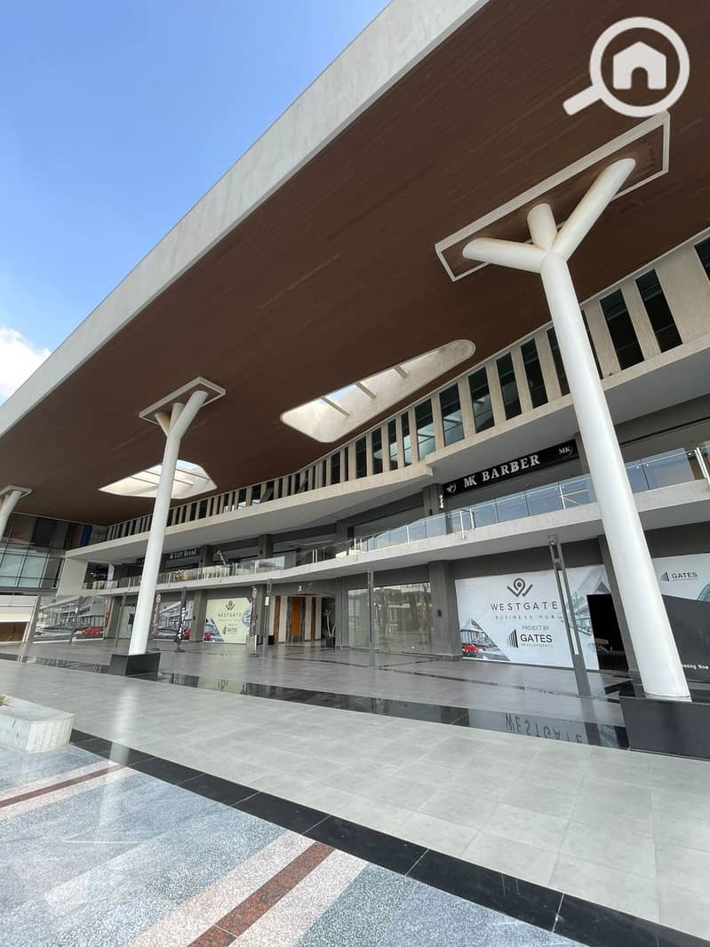 A commercial shop for sale, ready to move, prime location in West gate Mall, 6th of October - Więcej