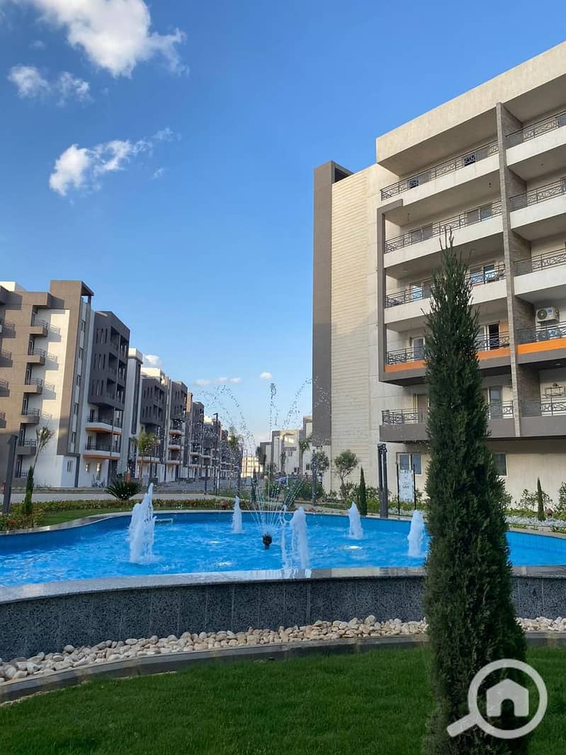 A ready-to-move apartment overlooking landscaping in ROCK EDEN next to the Trees neighborhood and Dream Land. - Ansicht 5