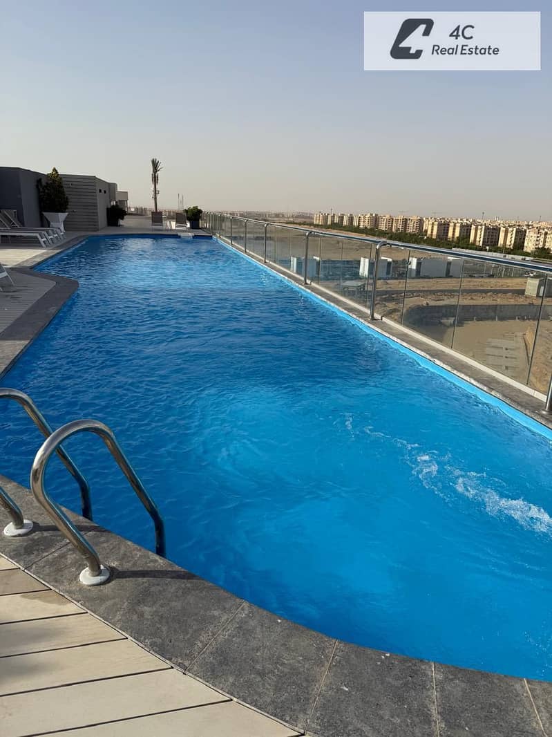 A resale apartment in Bloomfields Mostakbal City with an open view landscape and a distinctive layout available with a down payment and the remainder - Widok 3