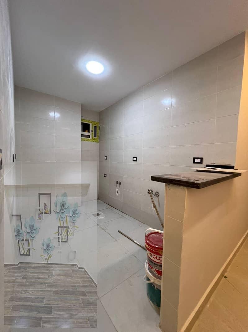 Ground floor apartment of 135 m² with a garden at the back in the Pyramids Gardens in the third gate. - Widok 5