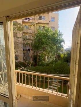 Apartment for Sale in Mostakbal Buildings, 12th District, Sheikh Zayed | 70 sqm | 2 Bedrooms | First Floor | Garden View - Więcej