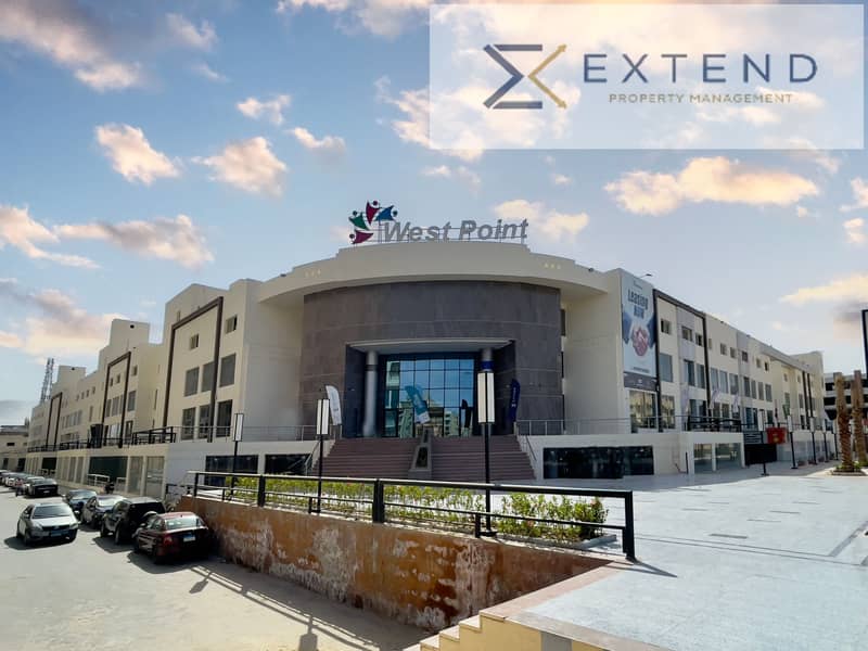 In a strategic location with a large daily visitor traffic, a commercial space for rent of 50m in the heart of 6th of October on the central axis inside a shopping mall, suitable for multiple activities. - Vista 5