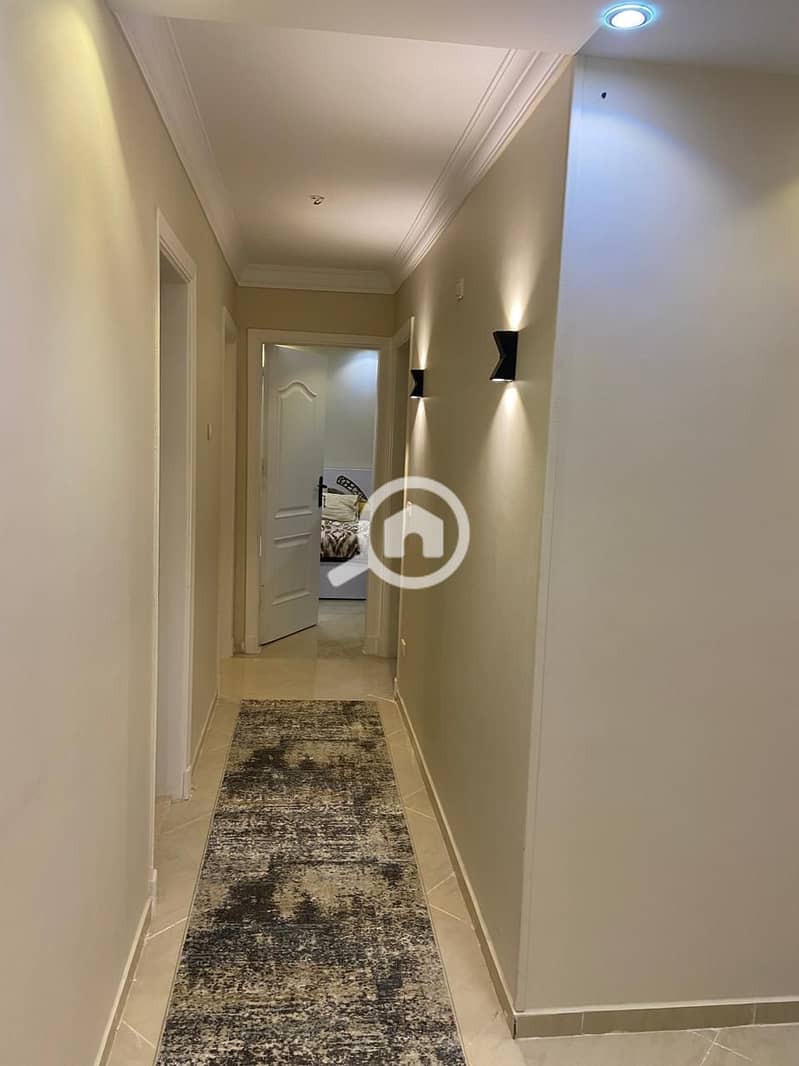 Furnished apartment for rent in Dar Misr 12 Compound, Sheikh Zayed. The apartment features 3 bedrooms, 2 bathrooms, a spacious reception area, and 2 b - Widok 5