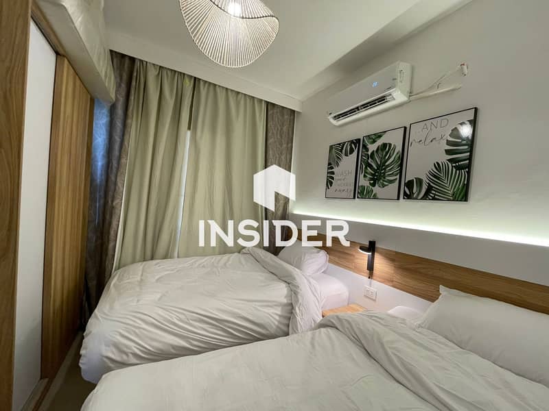 Chalet for Rent in Mountain View Ras El Hikma – New Rhodes | Ground Floor with Garden | Direct Pool View | 2BR | Fully AC – pohled 5