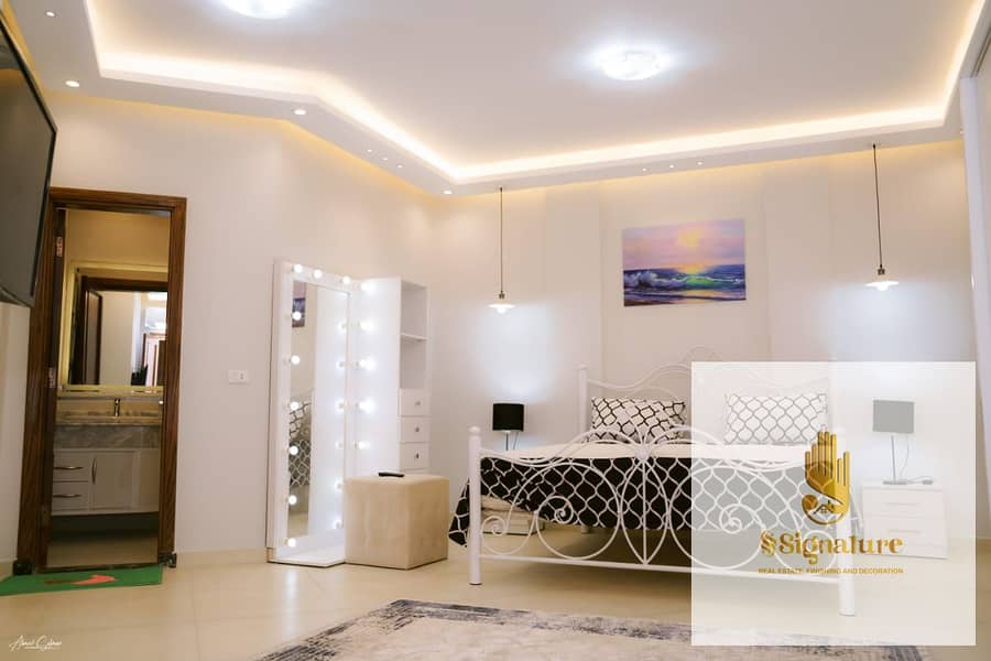 Furnished hotel-style basement apartment for rent, ultra-super-luxurious finishing, first occupancy, in North Shweifat, with a landscape view and a la - Więcej