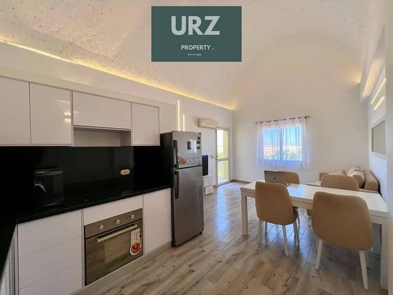 Lowest price 2bedroom lagoon view chalet fully finished with A/C for sale in Silver Sands Sidi Heneish North Coast near Beit El Bahr Almaza Bay - Widok 3