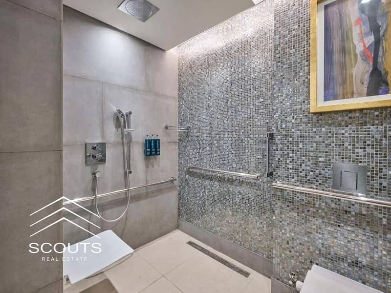 Hotel apartment for sale directly on the Nile, super finished with furniture and appliances, in Maadi Towers. - Więcej