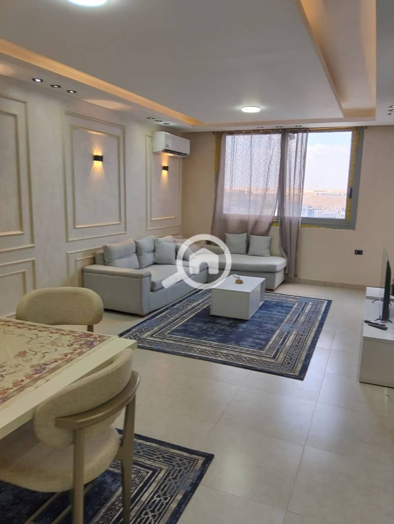 Furnished apartment for rent in the Wadi Degla Compound with an open view overlooking Al-Shaheed Axis, completely unspoiled, two bedrooms and a reception area, 2 bathrooms and a large kitchen with new ultra-lux finishing, fully air-conditioned with appliances and new furniture, located on the ninth floor, asking 35 in Wadi Degla Compound on the Maadi Ring Road, with security and guard service available 24/7. – pohled 2