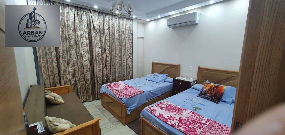 For rent a furnished hotel apartment in Crystal Plaza, Zahra El Maadi, on the ring road and next to Modern Academy, a prime location. - Vista 2