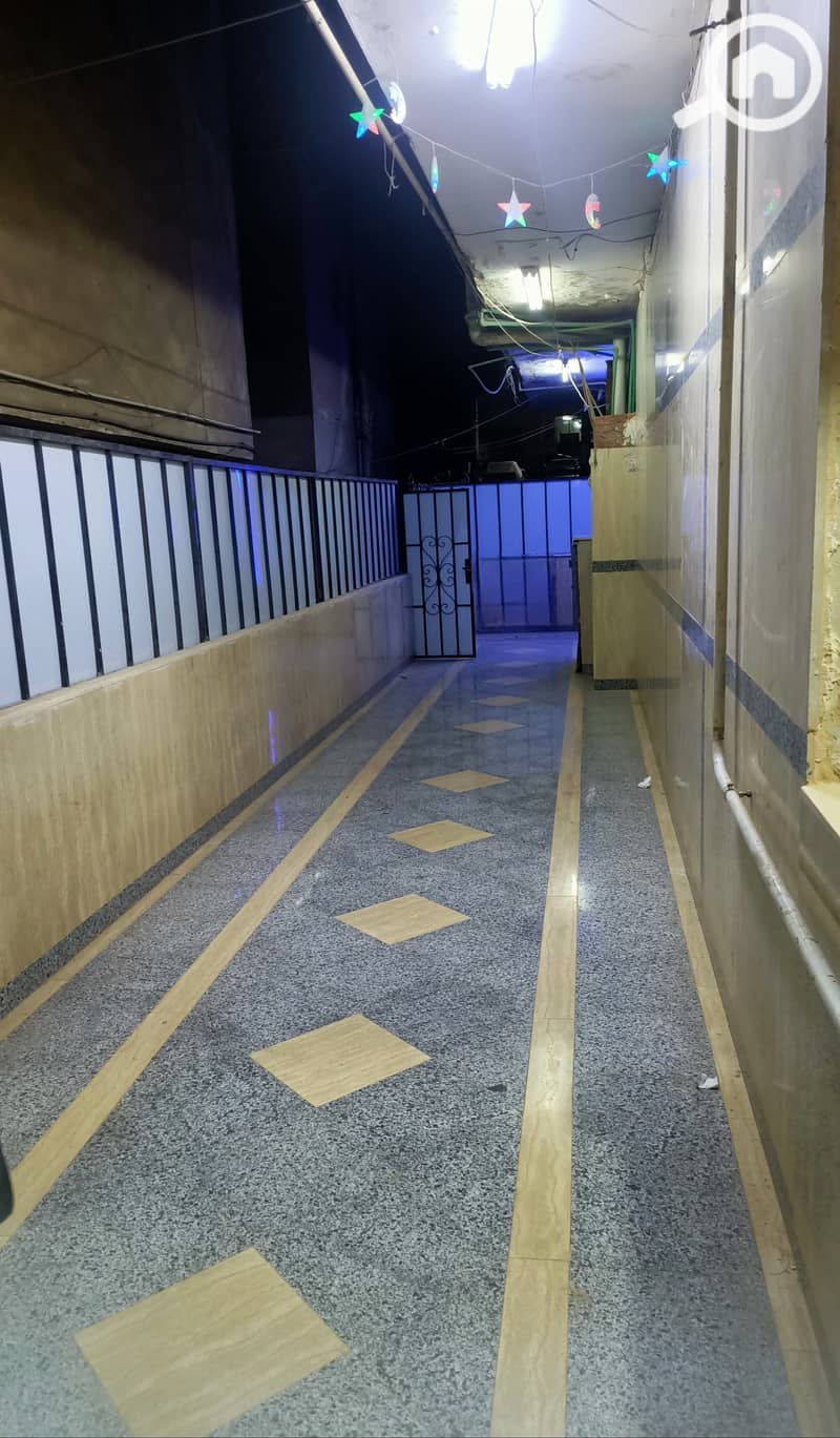Apartment for sale in the city of Abad Al-Rahman on the Maadi ring road behind the Al-Said Club in Katameya, with an area of 84 meters, two rooms, a reception, a bathroom, and a kitchen in semi-finishing. - Ansicht 3