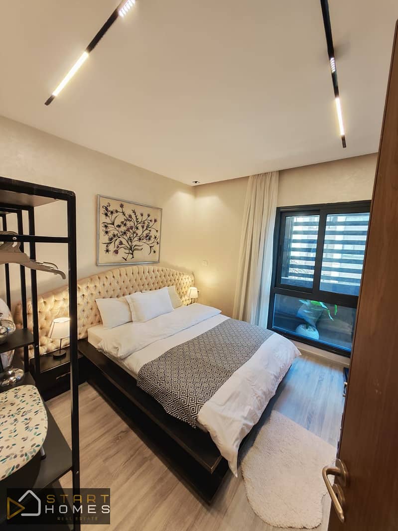 Furnished 67m² 1-bedroom studio for sale in Privado, Madinaty; features a garden view and is just steps away from amenities. - Widok 4