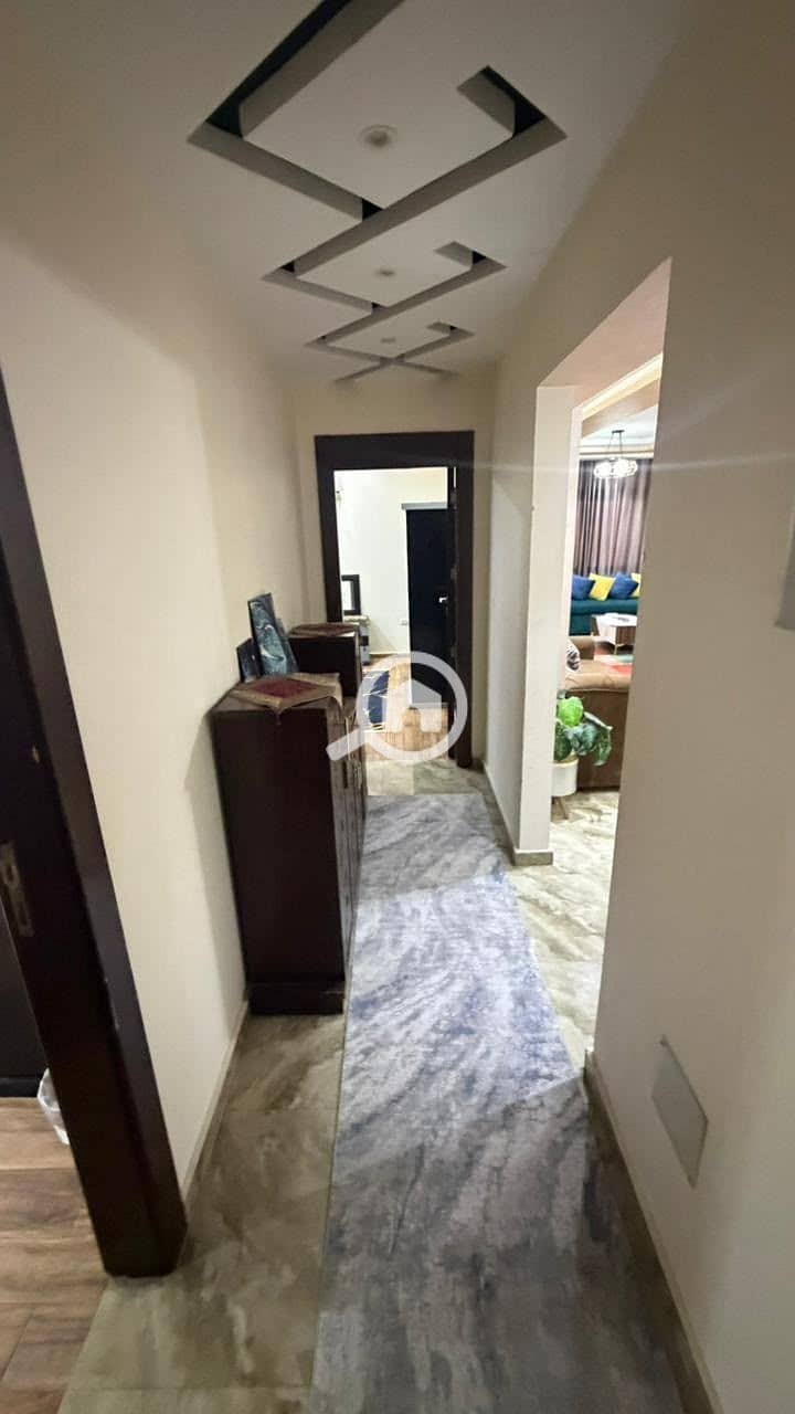 Furnished apartment for rent in One Katameya compound, area 160, with an open view overlooking the Ahmed Shawki axis, completely unblocked, three rooms and a reception, 2 bathrooms and a large kitchen, new ultra-lux finishing, fully air-conditioned with appliances and new furniture, on the ninth floor, asking 35 in One Katameya compound on the Maadi circular road, security guards available. - Widok 5
