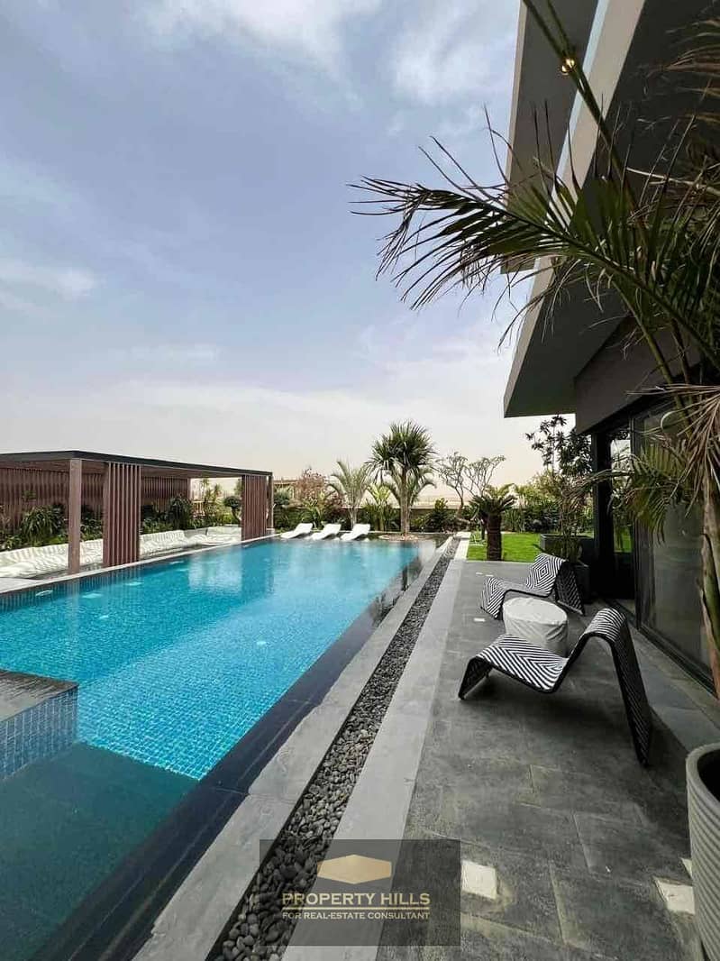 A villa ready for delivery in a few months, with a huge area of 643m and a private swimming pool in Swan Lake - Hassan Allam in Sheikh Zayed on 26th Axis directly next to First Heights, Rim Residence, and Joya, and across from Richmont and Samaa Zayed. - Widok 3