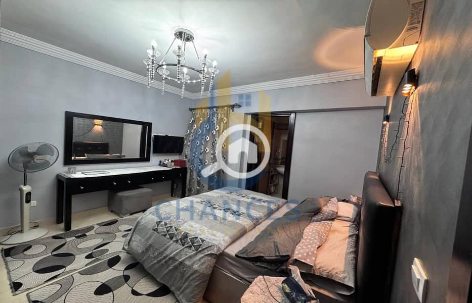 Apartment for sale in Bavaria Town Compound, directly on Maadi Ring Road, with an open view and the option to be sold furnished. - Mehr
