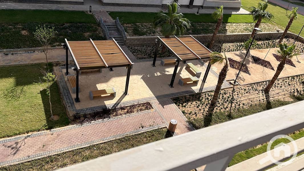 Resale apartment for sale, fully paid off, directly from the owner, with a double view overlooking the landscape in Janna zayed Compound. - Widok 3