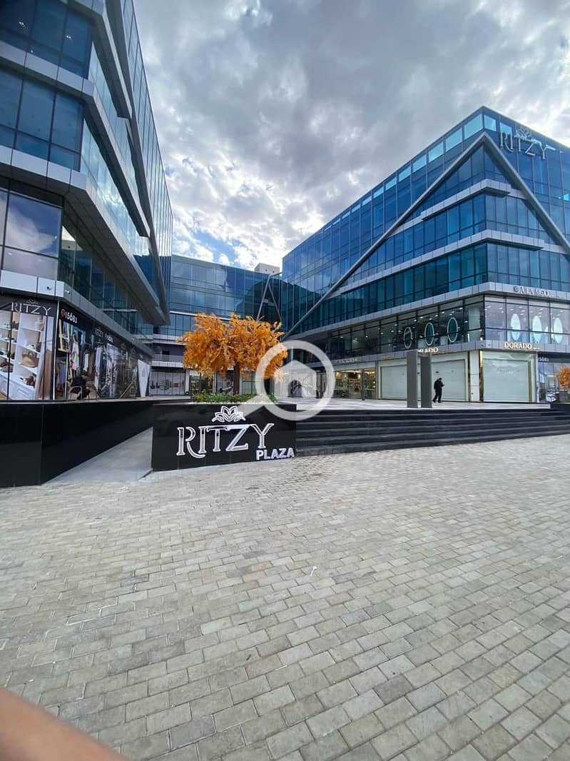 Office for rent, 63 sqm, in Ritzy Mall, Sheikh Zayed City (Al-Shabab Street); finished and equipped with air conditioning. - Widok 2