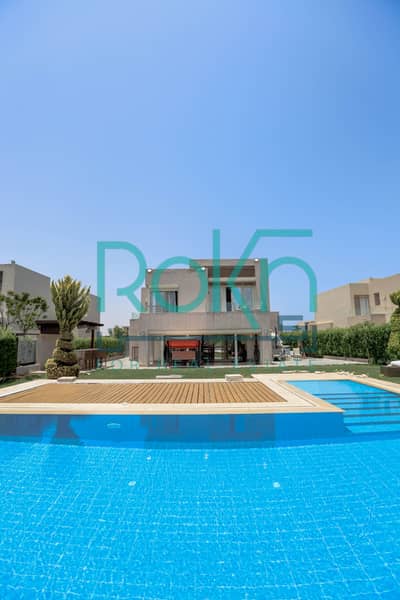 4 Bedroom Villa for Sale in North Coast, Matruh - 1 - Outdoor Space Swimming Pool + Garden (10). jpg 4 Bedroom Villa for Sale in North Coast, Matruh - 1 - Outdoor Space Swimming Pool + Garden (10). jpg