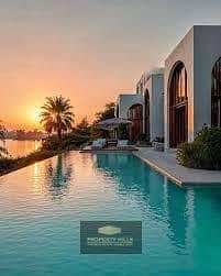 Twin villa finished directly on the Nile River in Sheikh Zayed next to New Giza near Sodic with installment options. - Więcej