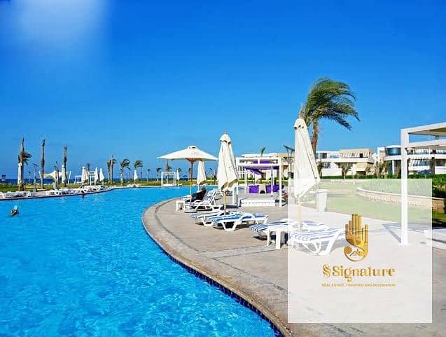 Cheapest price for a two-bedroom chalet, Ready To Move and furnished, with a swimming pool view in Marseilia Beach 4, North Coast, Sidi Abdel Rahman. - Fler