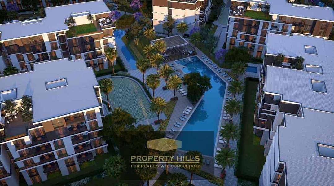 A spacious 4-room apartment in October Gardens with a down payment of 669,000 and the remaining amount in comfortable installments over the longest duration next to Roc Eden, Dream Land, Kanz, and Sun Capital. - Ansicht 3