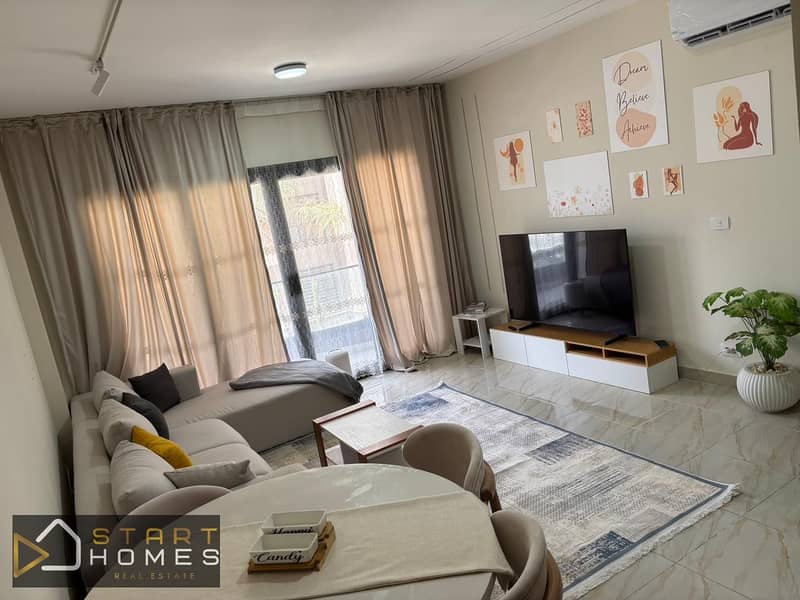 Furnished 100 m² two-bedroom apartment for rent in Madinaty (B15), featuring custom finishes and a fully equipped kitchen. - Widok 2
