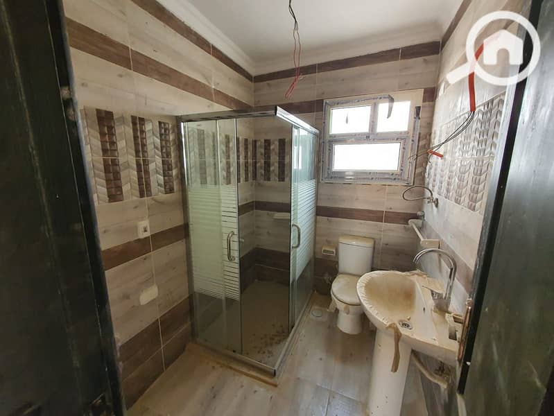 Apartment for rent in Janna Misr Compound, Second floor, open view of a large garden, special view, very close to the gate. - Aanzicht 2