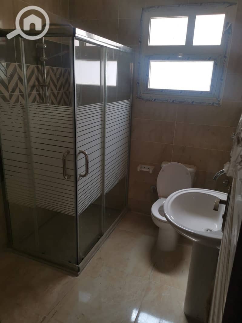 Apartment for rent in Janna Misr Compound, Second floor, open view of a large garden, special view, very close to the gate. - Aanzicht 3