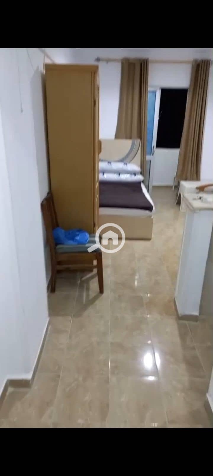 Furnished studio for annual rent, a room, bathroom, and kitchen inside a secure compound with 24-hour security. There are swimming pools, a private garden, and all facilities including water, electricity, and an elevator in Alexandria El Agami, 21st kilometer on the Palm Beach, in a very distinguished location. - Ansicht 5