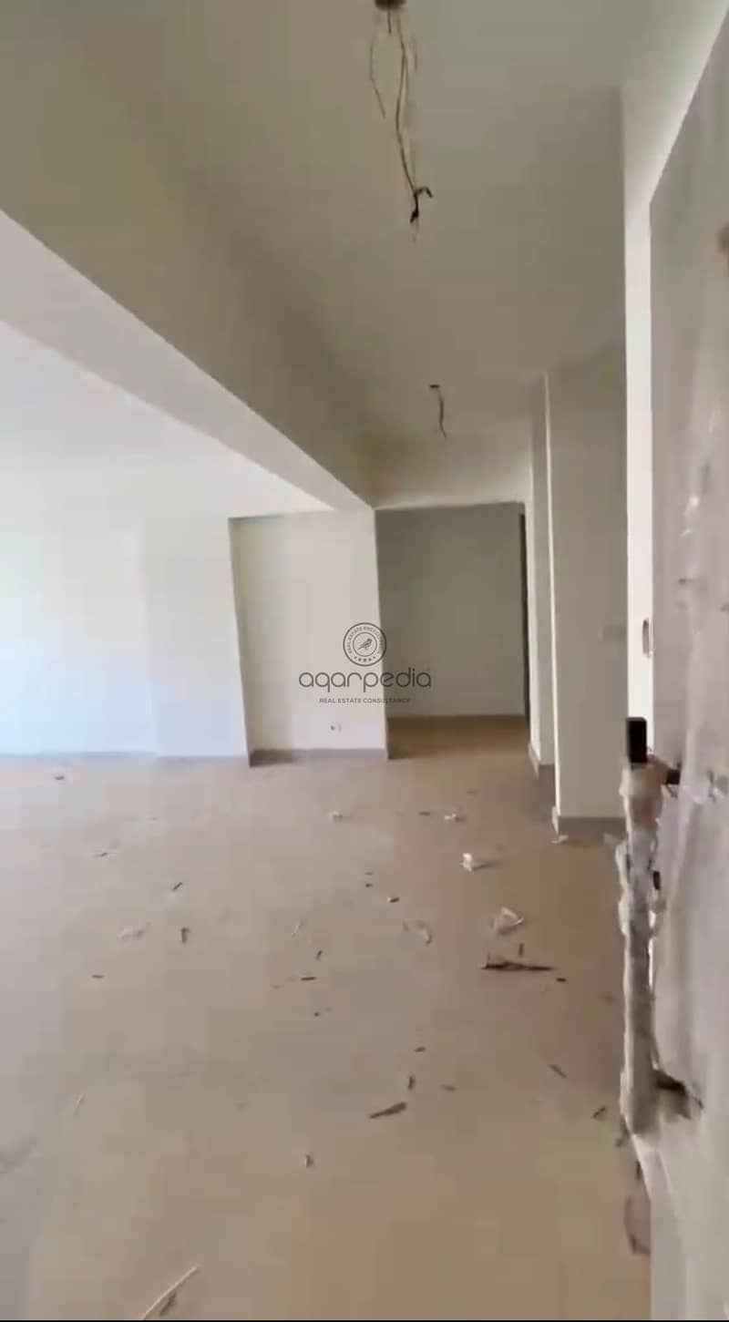 A premium apartment for sale in Palm Hills, Fifth Settlement, fully finished and ready for handover, with ample space including a club membership and parking. - Widok 3