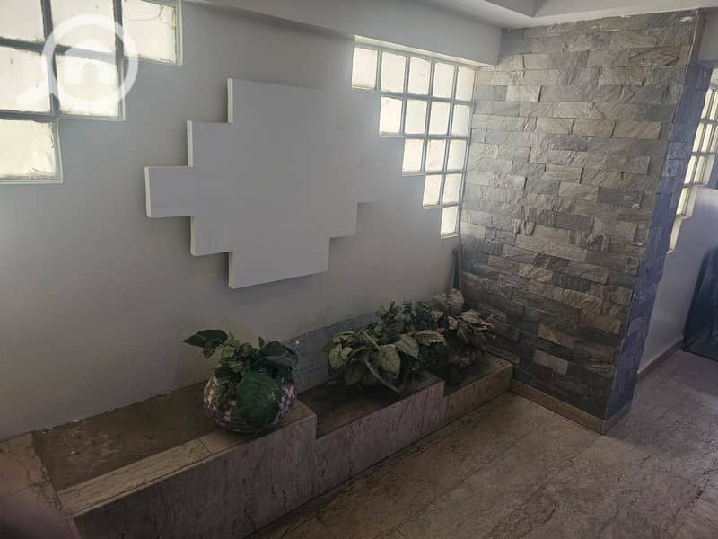 For companies and clinics, furnished office 100m on a side street from Ahmed Araby in Mohandessin, first floor, 20 thousand. A unique opportunity for companies and administrative offices looking for a ready-made location. - Mehr